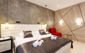 Posteľ alebo postele v izbe v ubytovaní Well Of Life Luxury Rooms