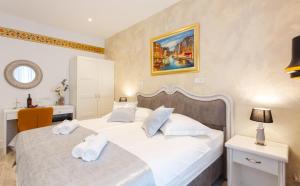 Posteľ alebo postele v izbe v ubytovaní Well Of Life Luxury Rooms