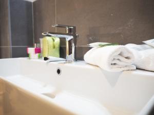 Postel nebo postele na pokoji v ubytování Hotel Centro