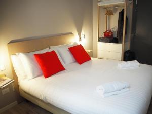 Postel nebo postele na pokoji v ubytování Hotel Centro