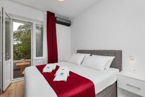 Postel nebo postele na pokoji v ubytování Luxury Rooms Paradise Garden