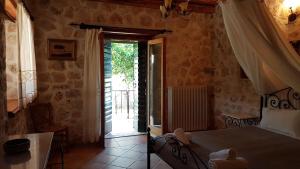 Posteľ alebo postele v izbe v ubytovaní Castello Bellos Villas + 37 fotografií