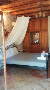 Posteľ alebo postele v izbe v ubytovaní Castello Bellos Villas