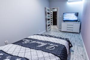Krevet ili kreveti u jedinici u objektu Apartament w pobliżu jeziora Niegocin