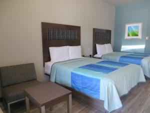 Postel nebo postele na pokoji v ubytování Hotel Blue - Woodlands