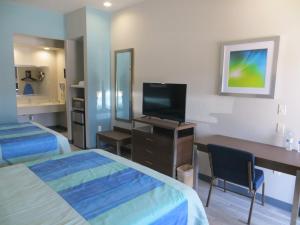 TV a/nebo společenská místnost v ubytování Hotel Blue - Woodlands