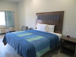 Postel nebo postele na pokoji v ubytování Hotel Blue - Woodlands