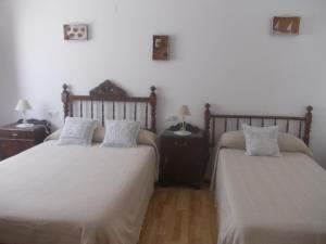 Posteľ alebo postele v izbe v ubytovaní Casa de pueblo Godall