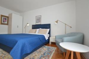 Ліжко або ліжка в номері Downtown Zadar Apartments