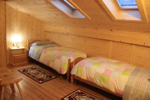 Albergo Diffuso Fallerにあるベッド