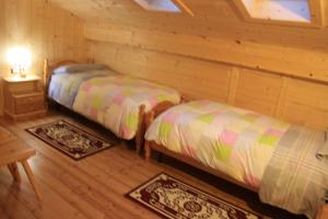 Albergo Diffuso Fallerにあるベッド