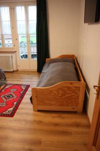 Postelja oz. postelje v sobi nastanitve B&B Stirnimann