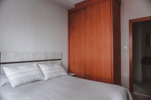 Łóżko lub łóżka w pokoju w obiekcie Piso centro