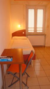 En eller flere senge i et værelse på StadtHotel Passau