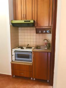 Kuchyň nebo kuchyňský kout v ubytování Hotel Rai + 31 fotografií