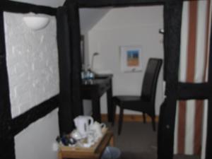 A restaurant or other place to eat at Rose & Crown 