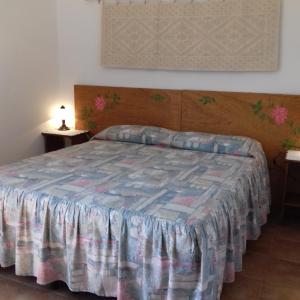 A bed or beds in a room at Canne Al Vento