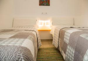 Postel nebo postele na pokoji v ubytování Casa Pinyera - Plus Costa Brava