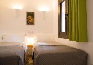 Postel nebo postele na pokoji v ubytování Casa Pinyera - Plus Costa Brava