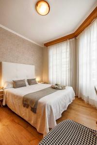 Posteľ alebo postele v izbe v ubytovaní Hostal Zahara