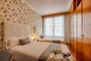 Posteľ alebo postele v izbe v ubytovaní Hostal Zahara