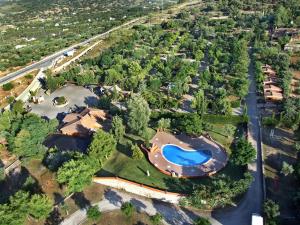 an overhead view of a house with a swimming pool at Complejo Turistico El Sur in Ronda