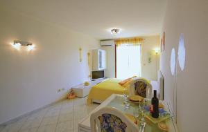Postel nebo postele na pokoji v ubytování Apartment Rosana