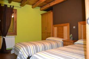 Postel nebo postele na pokoji v ubytování Apartamentos La Era