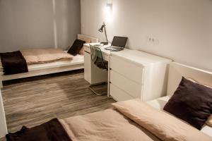 Postel nebo postele na pokoji v ubytování 4 Rooms