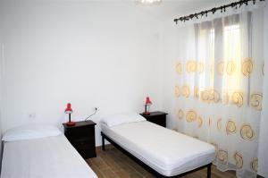 Katil atau katil-katil dalam bilik di Pineta Spiaggia Grande 2