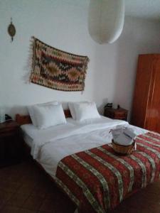 Postel nebo postele na pokoji v ubytování Kilim Hotel