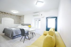 Postel nebo postele na pokoji v ubytování Villa Kate