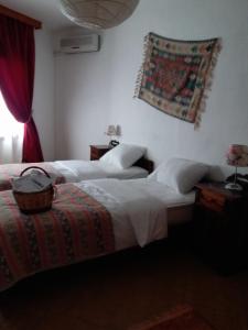 Postel nebo postele na pokoji v ubytování Kilim Hotel