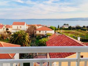 a view from the balcony of a house at Apartments Ruza in Kaštela