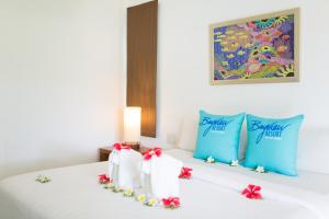 Rúm í herbergi á Phi Phi Bayview Resort