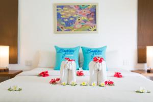Rúm í herbergi á Phi Phi Bayview Resort