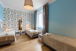 Posteľ alebo postele v izbe v ubytovaní Premium Hostel