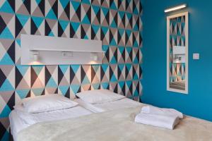 Posteľ alebo postele v izbe v ubytovaní Premium Hostel