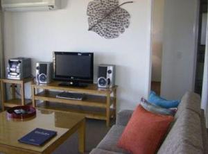 A television and/or entertainment center at Meridian Caloundra