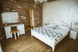 Postel nebo postele na pokoji v ubytování Paradisul Transilvaniei Resort