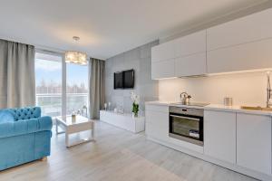 Kuchyň nebo kuchyňský kout v ubytování Apartament Mistral Gdynia