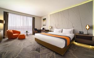 Posteľ alebo postele v izbe v ubytovaní Tigre de Cristal Resort & Casino Vladivostok