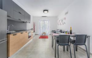Kuchyň nebo kuchyňský kout v ubytování Apartments Katja