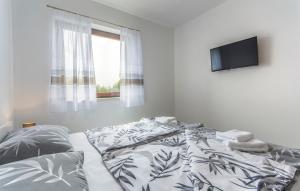 Postel nebo postele na pokoji v ubytování Apartments Katja