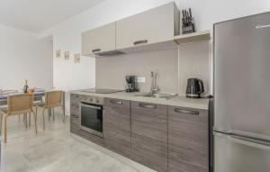 Kuchyň nebo kuchyňský kout v ubytování Apartments Katja