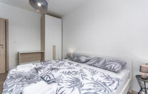 Postel nebo postele na pokoji v ubytování Apartments Katja