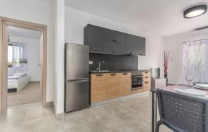Kuchyň nebo kuchyňský kout v ubytování Apartments Katja