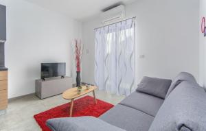 TV a/nebo společenská místnost v ubytování Apartments Katja