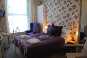 Postelja oz. postelje v sobi nastanitve Craig-Ard Hotel