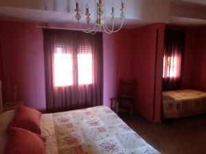 Postel nebo postele na pokoji v ubytování Posada La Reja